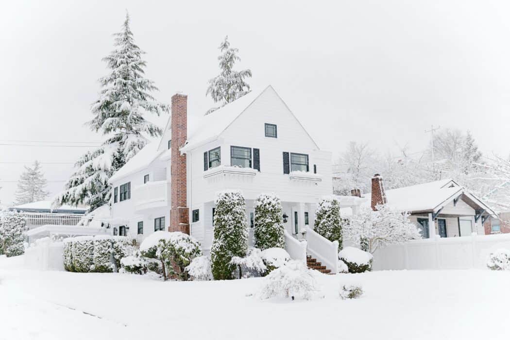 a beautiful snow covered home