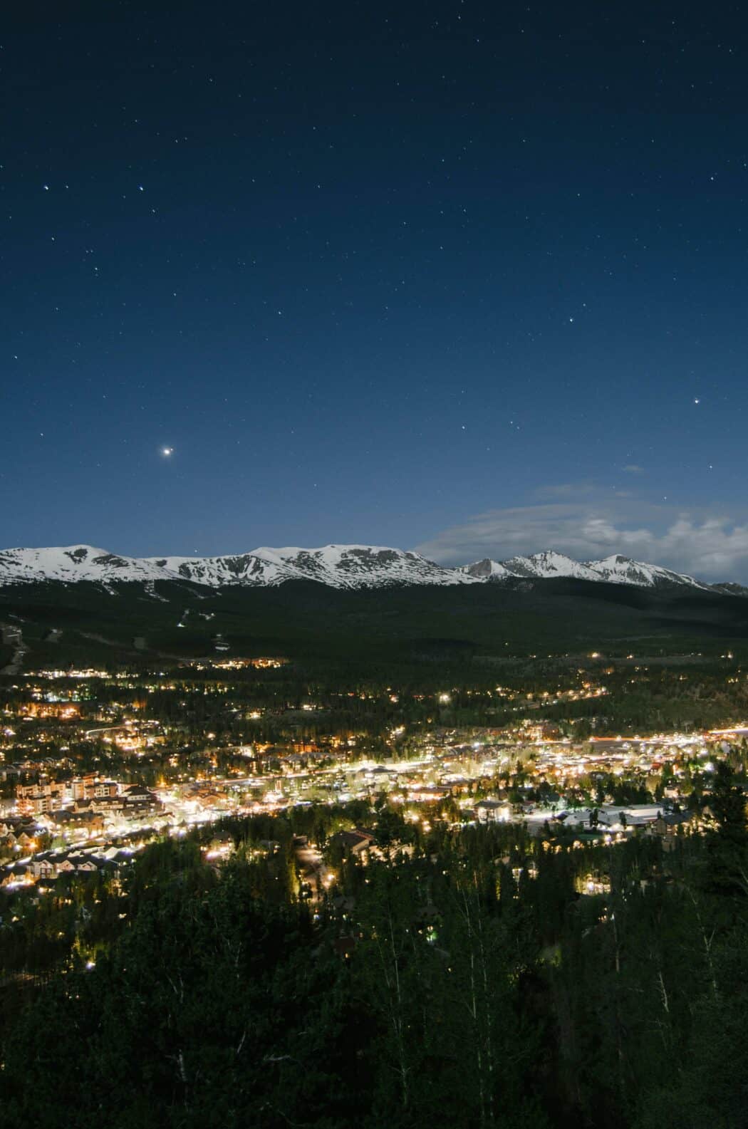 Overlooking Breckenridge Colorado. Night sky showing mountains and city lights